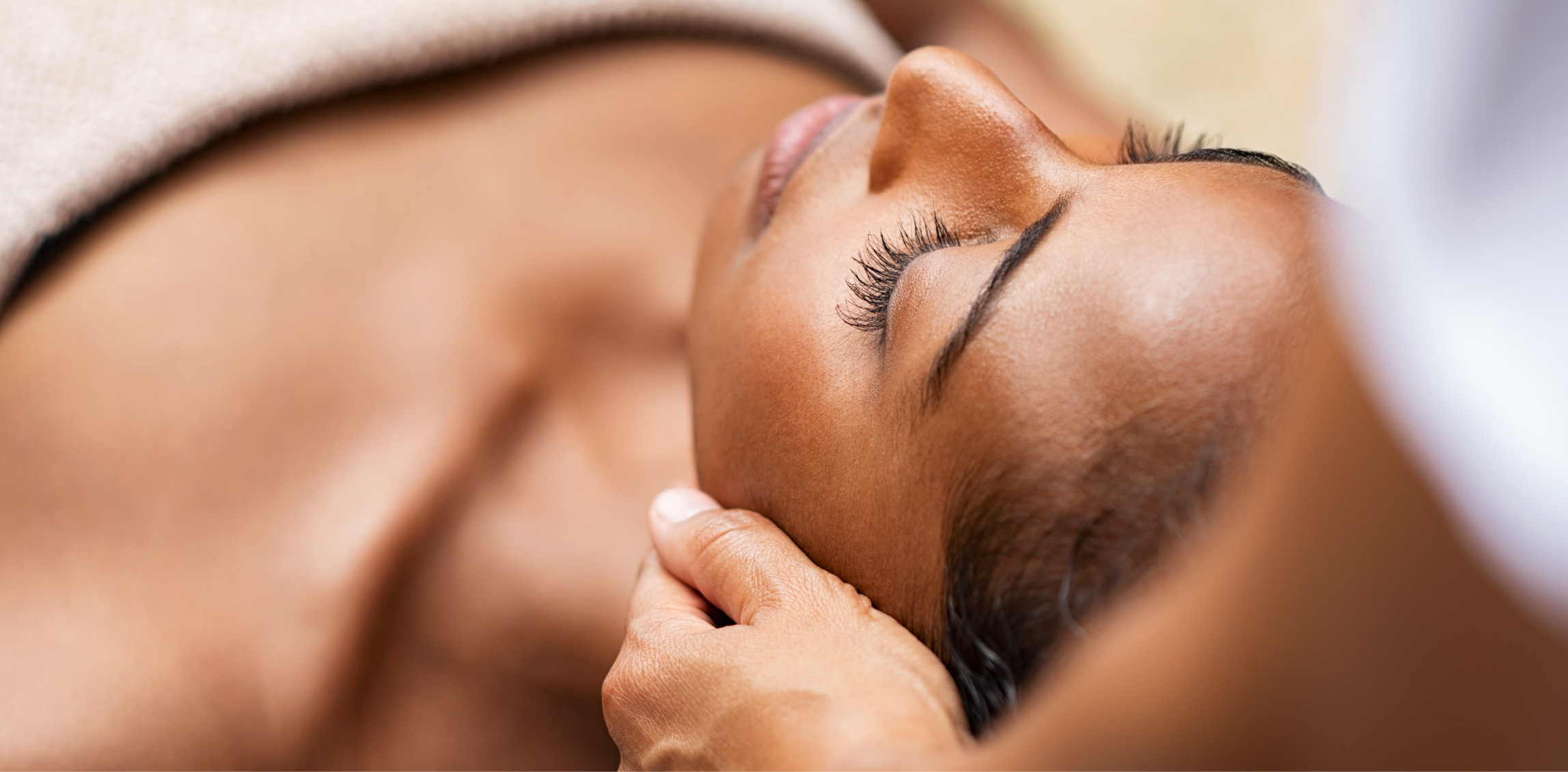 Woman receiving body treatments
